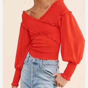 BB Dakota Red-orange off the shoulder top.